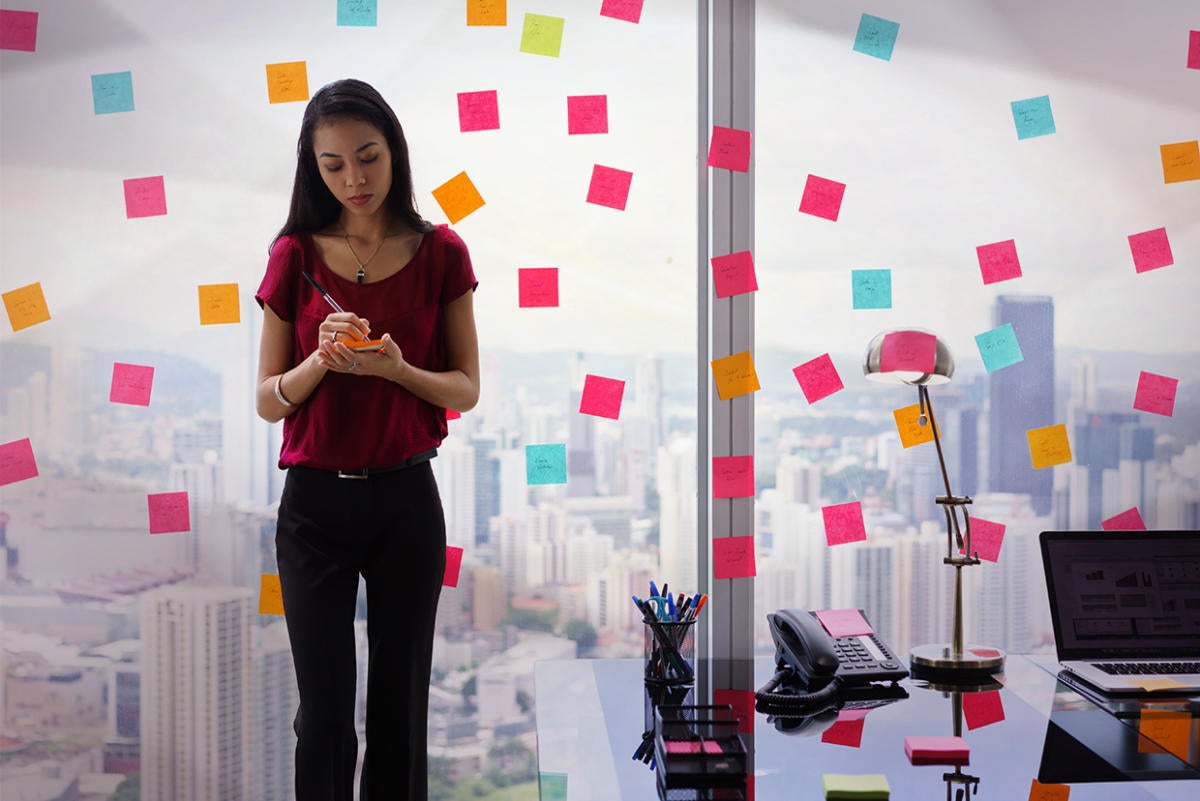 business woman organization sticky notes